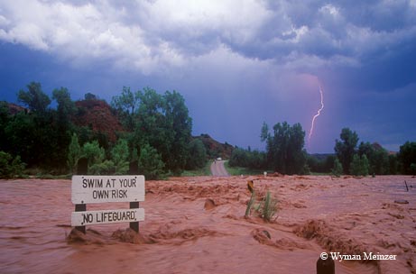 The Prairie Dog Fork of the Red River churns over a road crossing in Palo Duro Canyon.