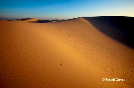 Sand dunes and sky dominate the landscape at Monahans State Park in West Texas.
