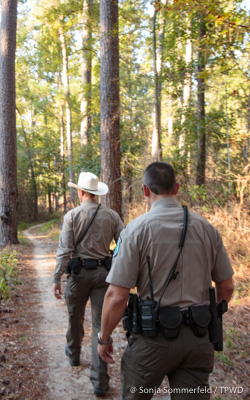 men on trail