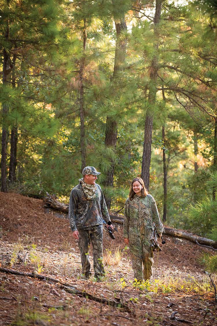 male and female bow hunting