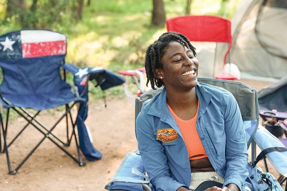 Black Women Who having a laugh at campsite