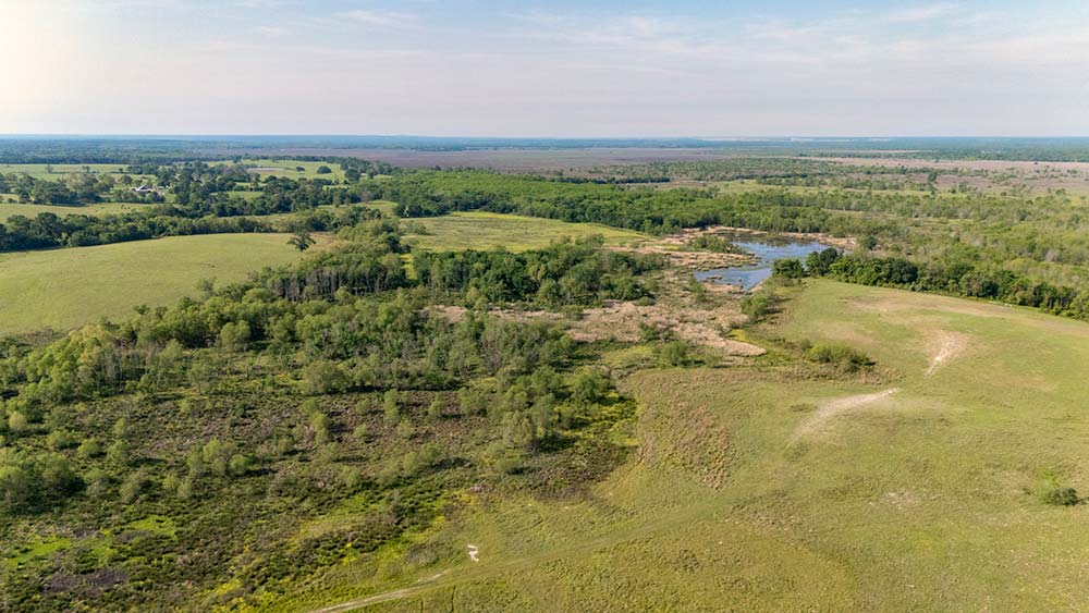land along the Trinity and the Rio Grande
