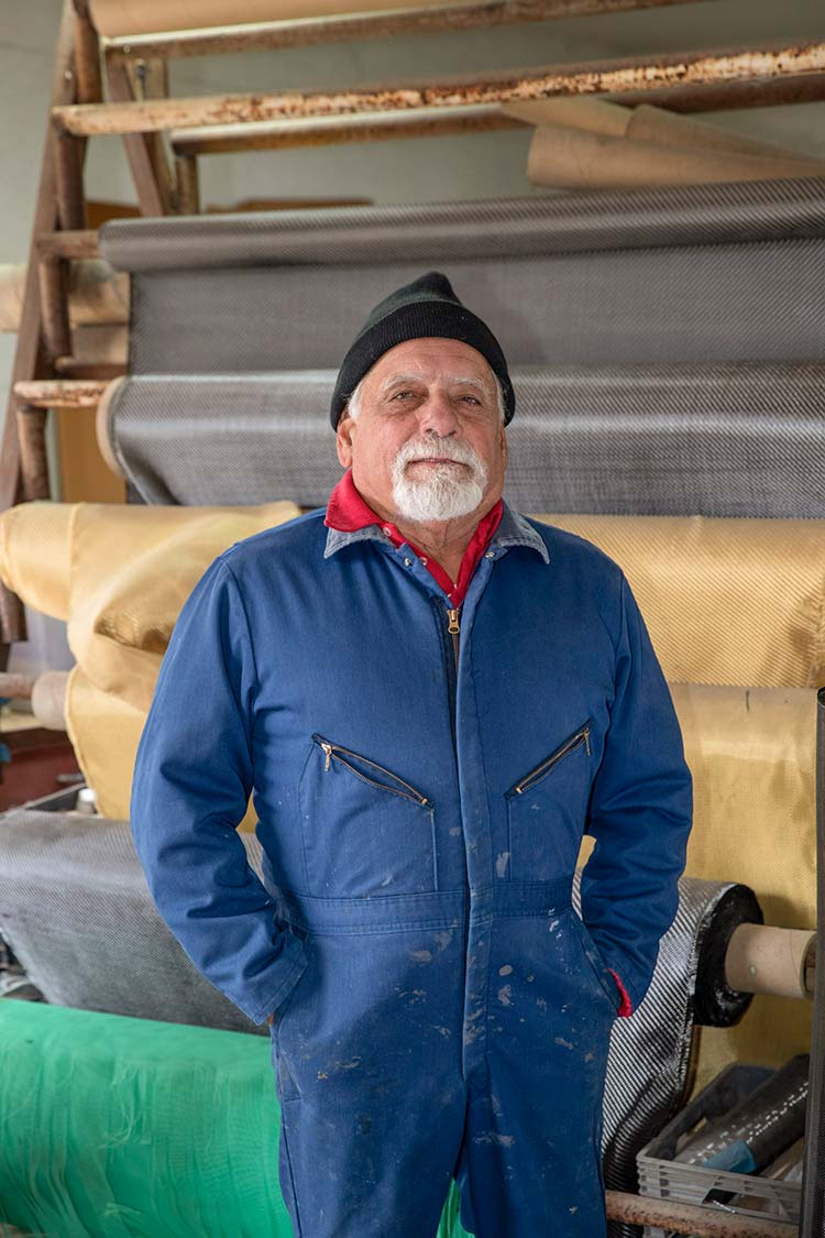 John Bugge uses rolls of carbon and Kevlar to make canoes