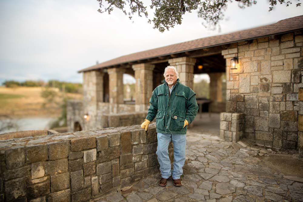 Fred Underwood enjoys the CCC-built pavilion and lake at Garner Park Ranch, one of the first CCC projects in Texas.