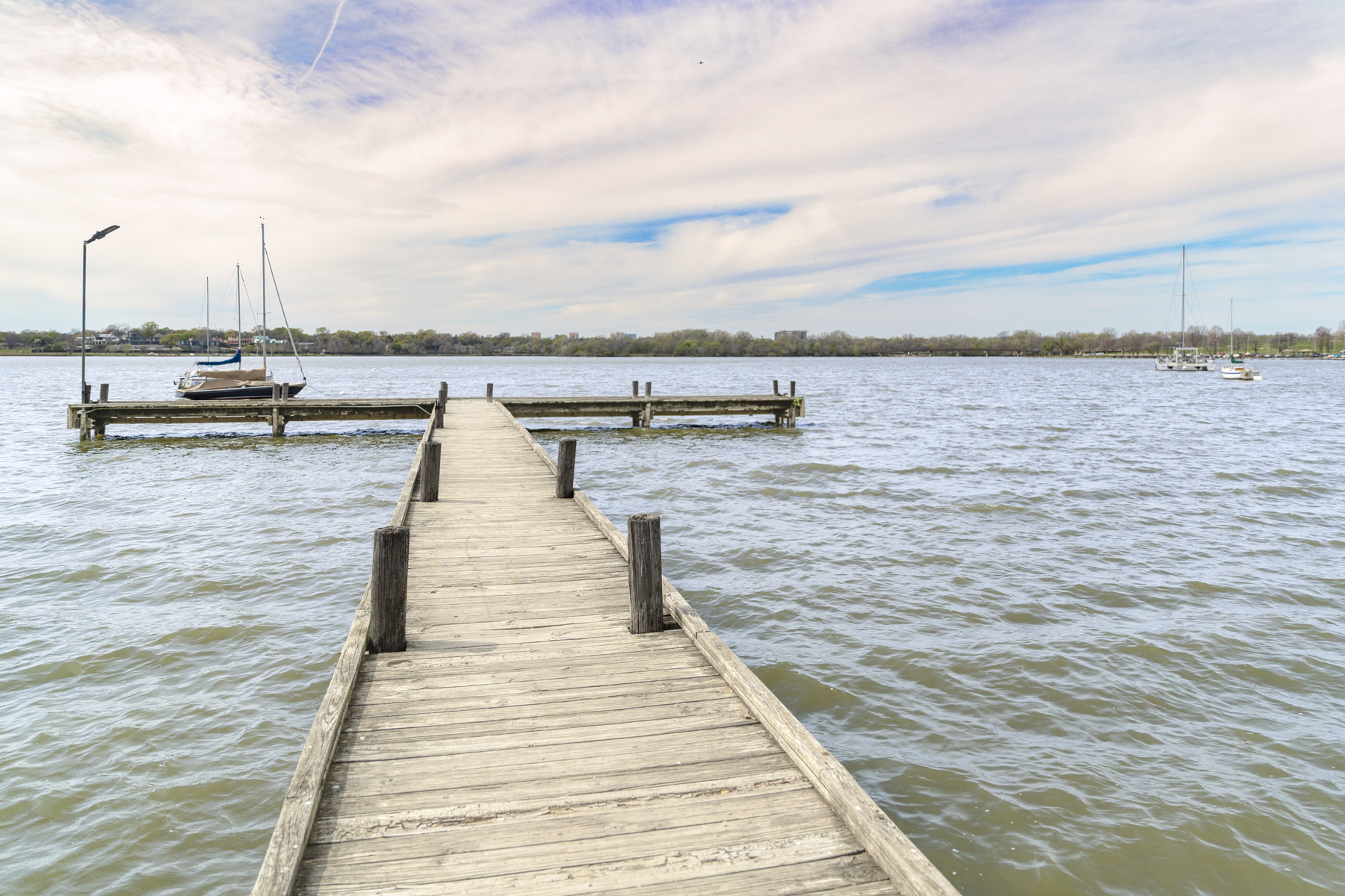 Dock stretches over the water at White Rock Lake outside of Dallas
