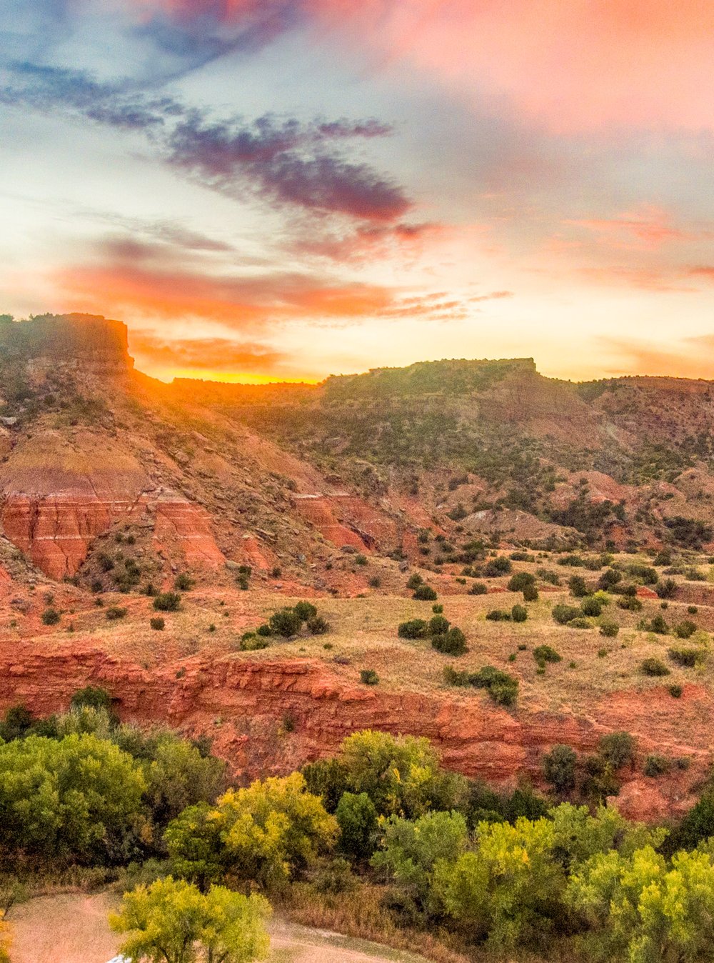 A sunrise over Sorenson Peak at Palo Duro Canyon State Park