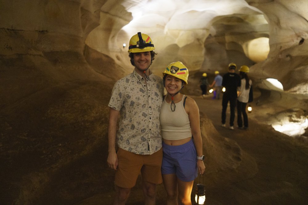 People standing in a cave at Longhorn Caverns.