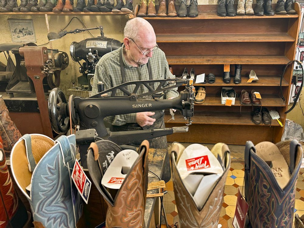 0325_Travel_Dogwood_2024 March Ciity Shoe Shop Palestine_JohnHOstdick
