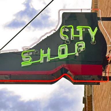 0325_Travel_Dogwood_2024 March Palestine Shoe Shop logo_JohnHOstdick