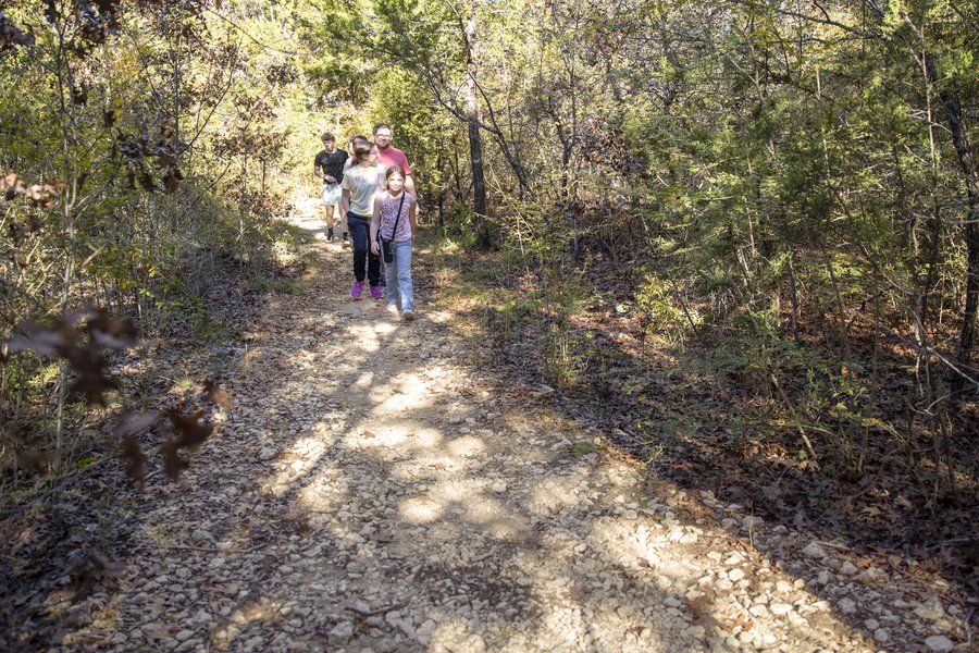 People on Coyote Run Trail at Cleburne State Park