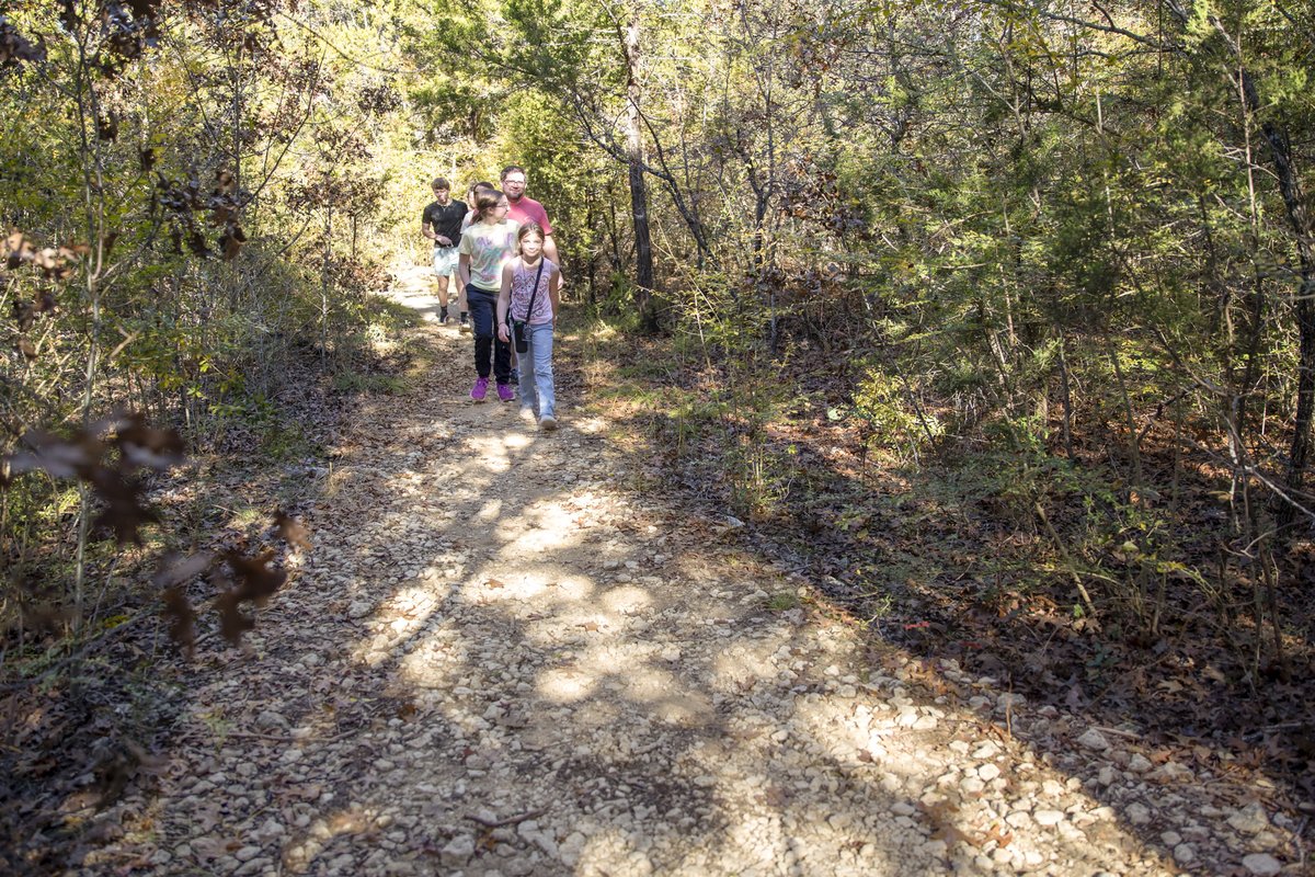 People on Coyote Run Trail at Cleburne State Park