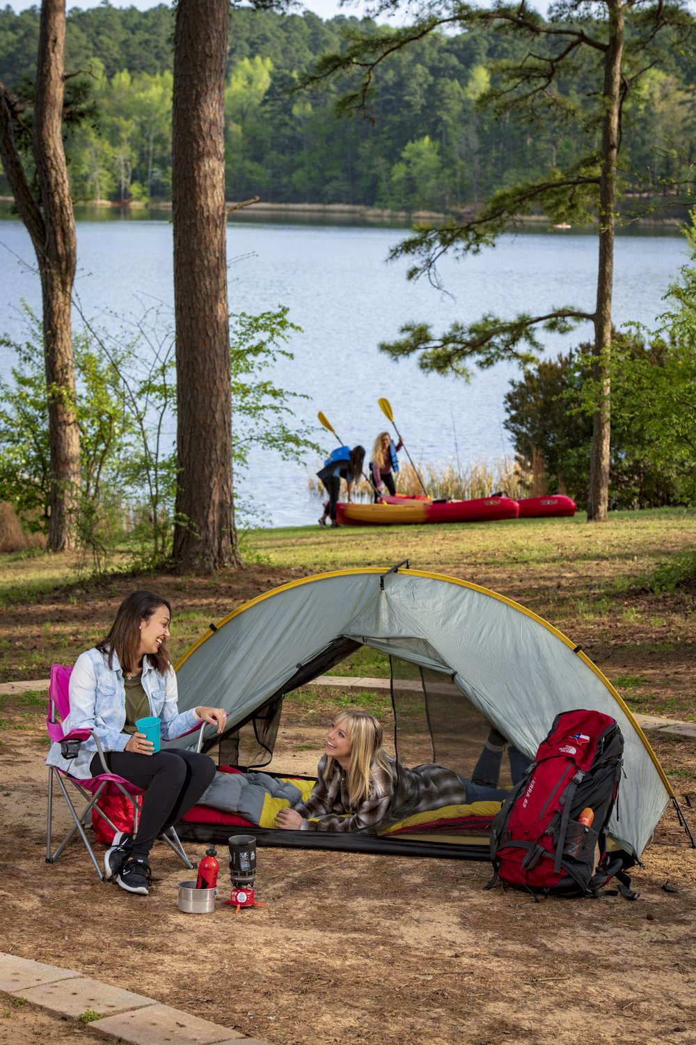 Two female Gen Z campers hanging out at a Tyler State Park