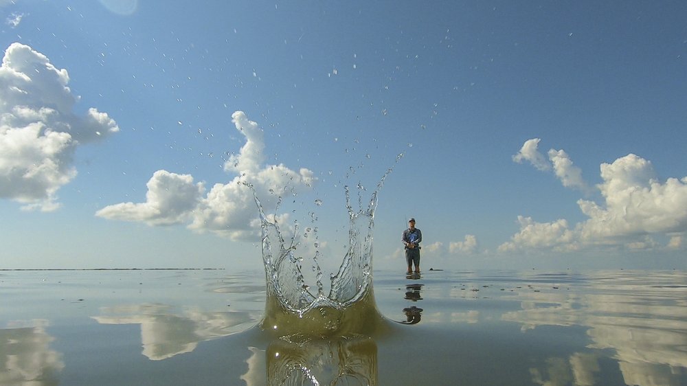 Close-up of a splash in the water from an angler's cast
