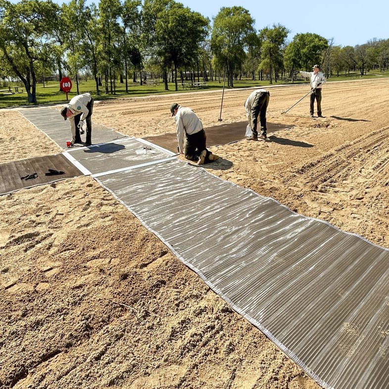 0425_F-Accessibility_LakeRayRoberts_Jbbeachmat2_JessicaBurkeTPWD