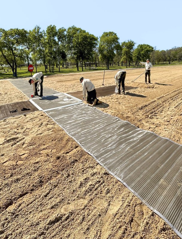 0425_F-Accessibility_LakeRayRoberts_Jbbeachmat2_JessicaBurkeTPWD