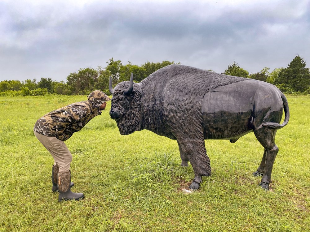 0425_Travel-Ennis_Kachine_Buffalo kiss_LerrinJohnsonTPWD