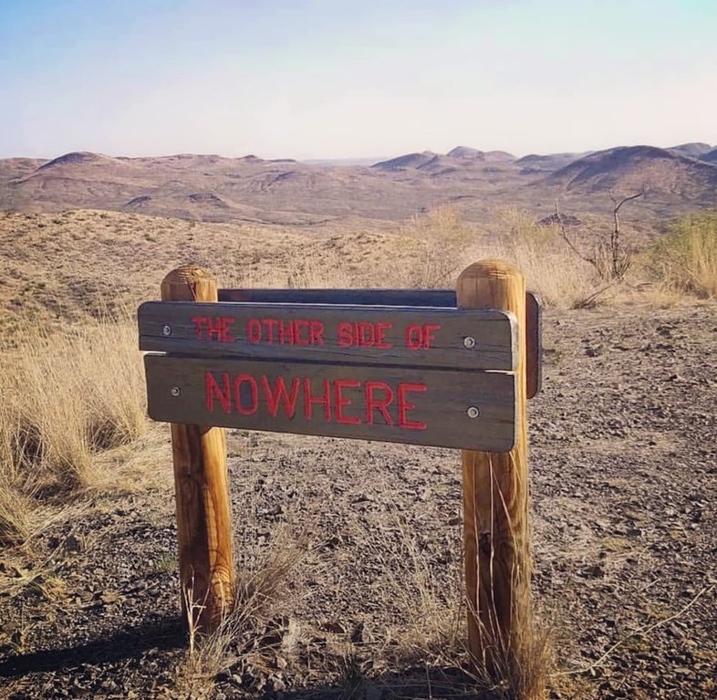 A sign that reads "the other side of nowhere" at Big Bend Ranch State Park