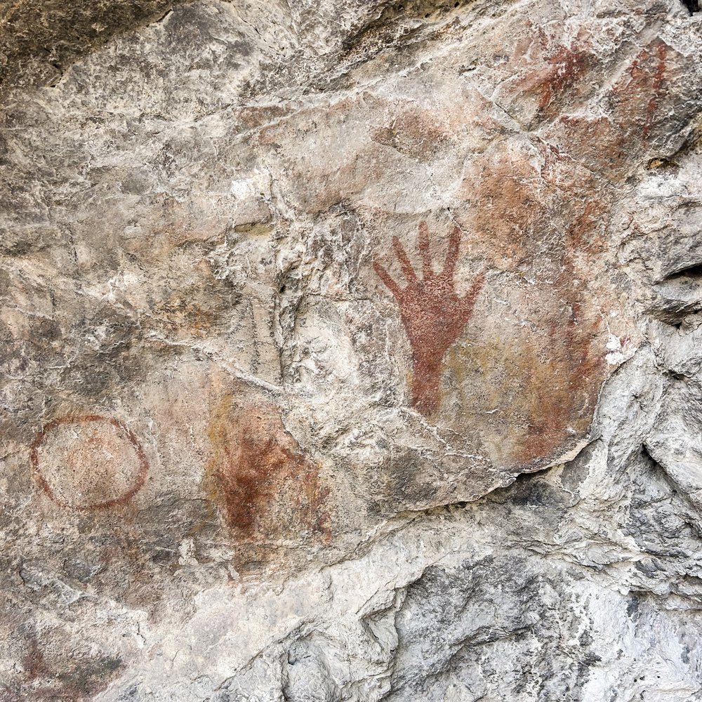Ancient handprint on a canyon wall.
