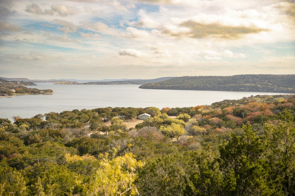 A view of a lake from a scenic overlook.