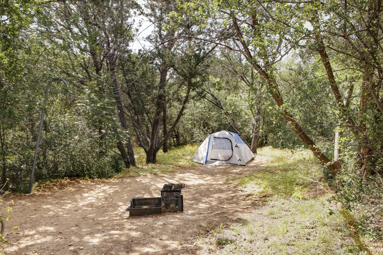 A tent on a primitive camp site.