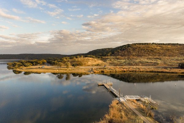Overlook of the fishing pier with the sky reflecting in the water