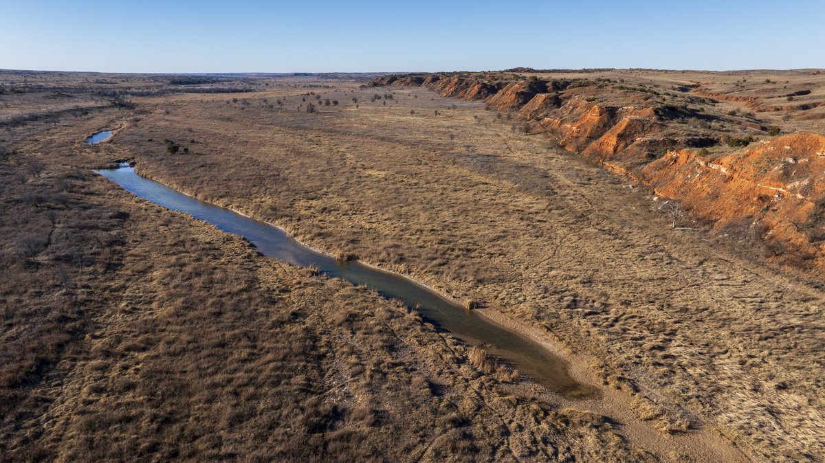 Matador Wildlife Management Area with a view of Pease River and a rocky ridge.