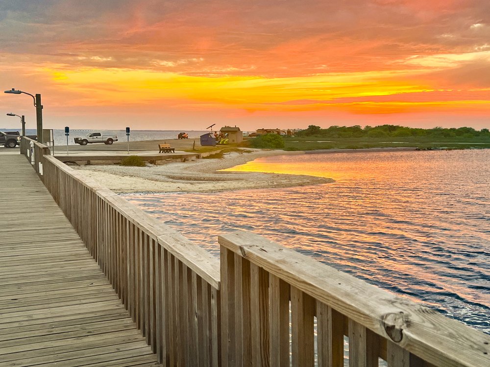 A view of the water from a pier.