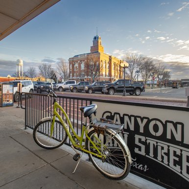 A view of a courthouse and town square.