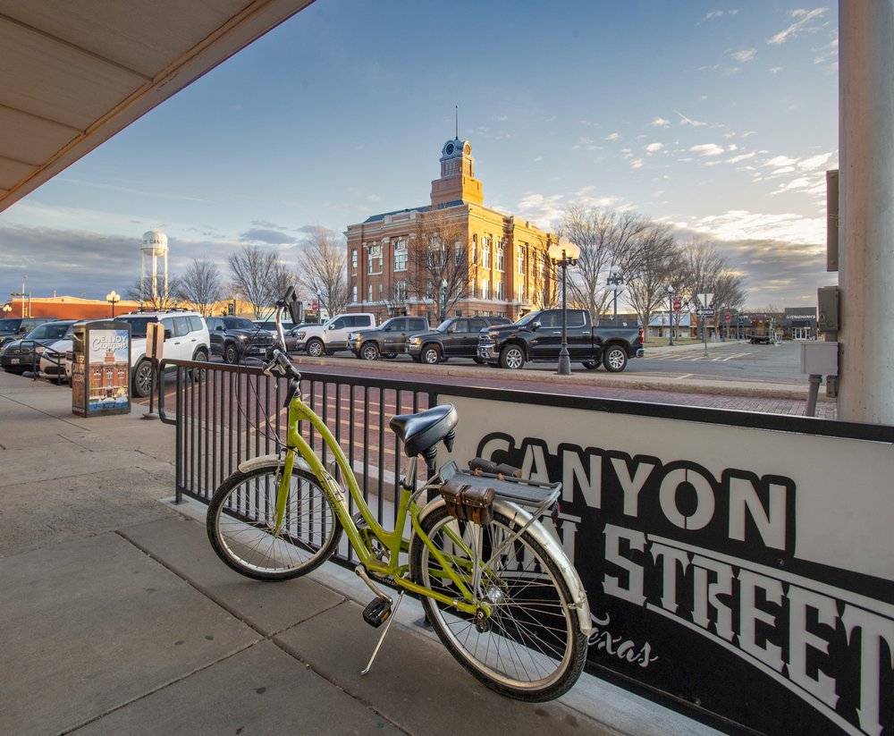 A view of a courthouse and town square.