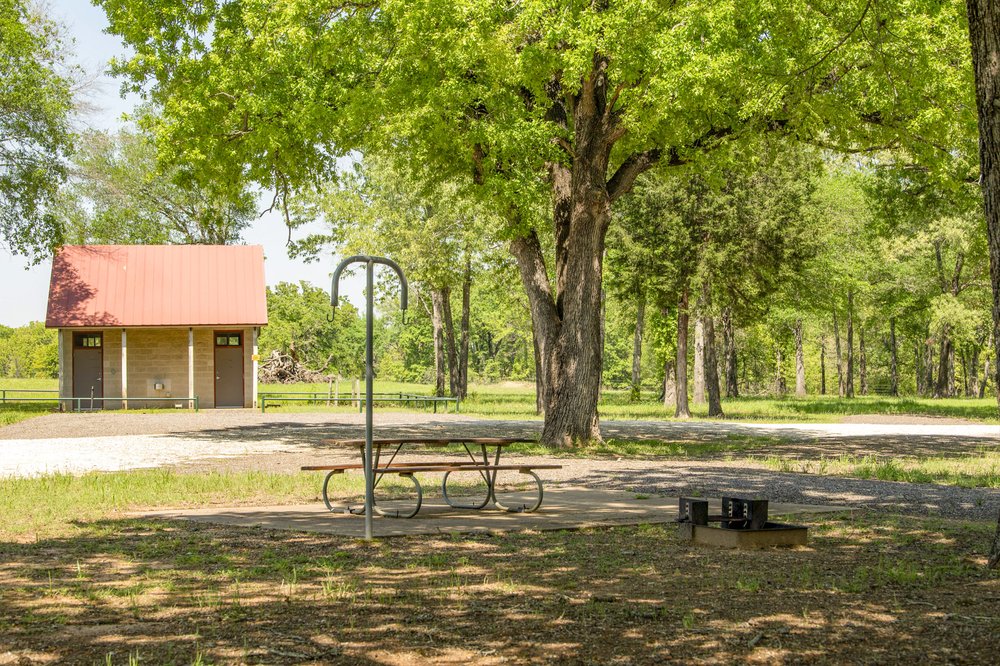 Shaded campground near main road and bathrooms in Gus Engeling WMA