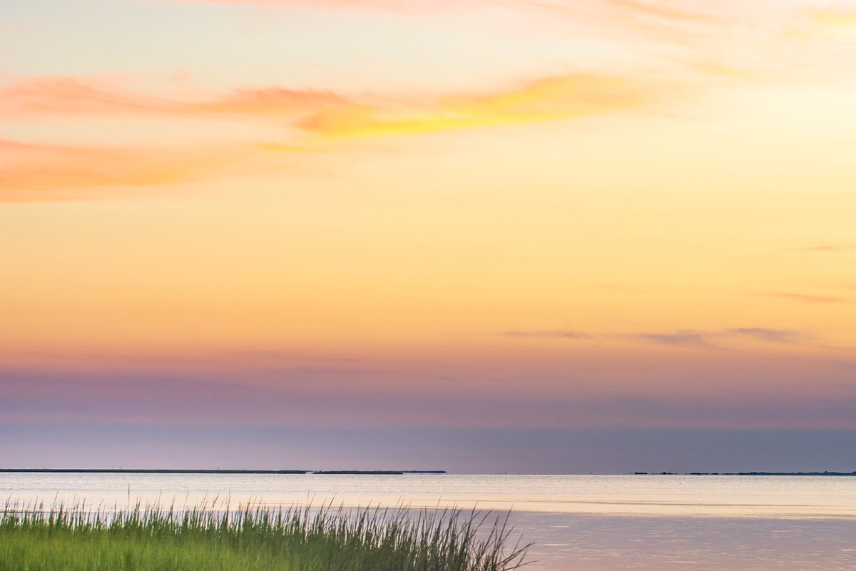 Beautiful colors of the sky after sunset over Galveston Bay in Galveston Island State Park