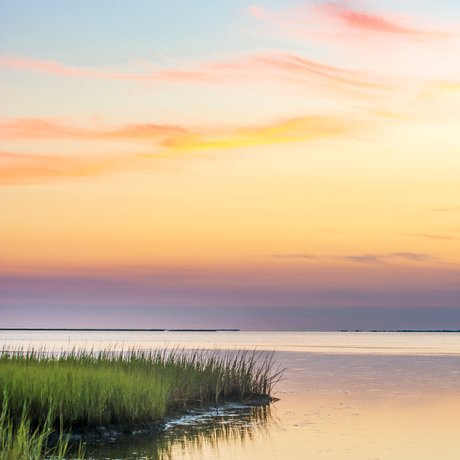 Beautiful colors of the sky after sunset over Galveston Bay in Galveston Island State Park