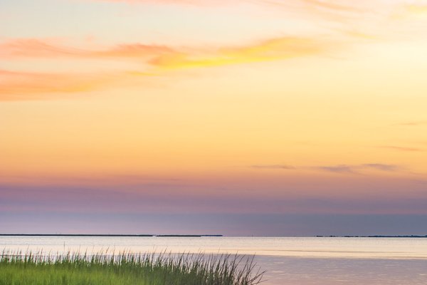 Beautiful colors of the sky after sunset over Galveston Bay in Galveston Island State Park
