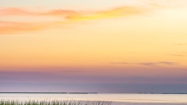 Beautiful colors of the sky after sunset over Galveston Bay in Galveston Island State Park