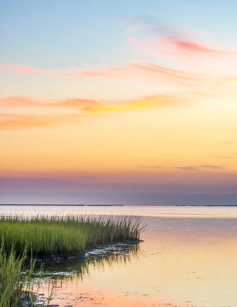 Beautiful colors of the sky after sunset over Galveston Bay in Galveston Island State Park