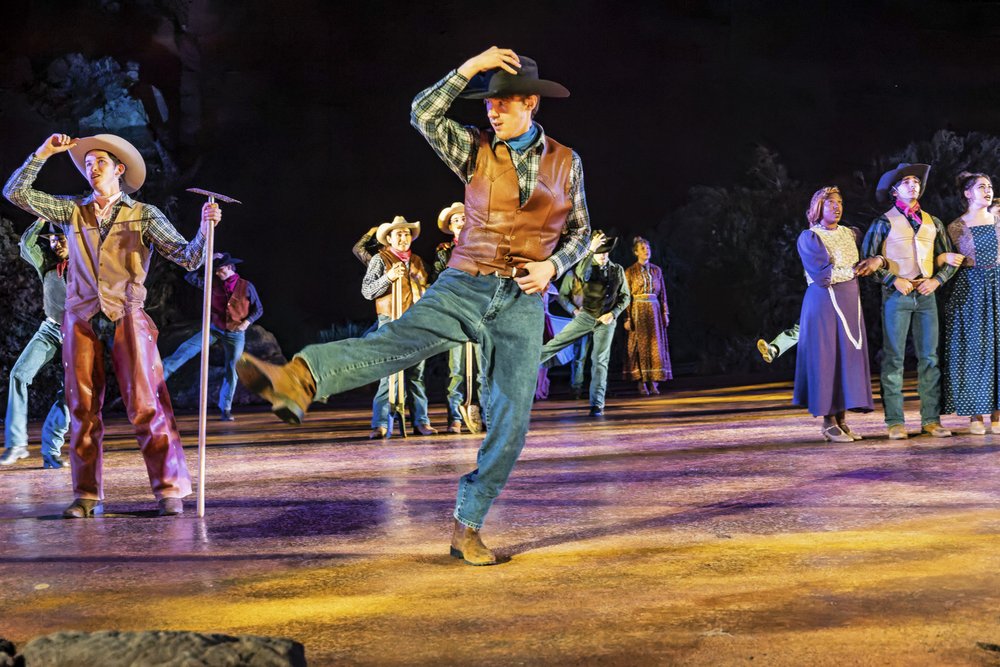 People performing on a stage.