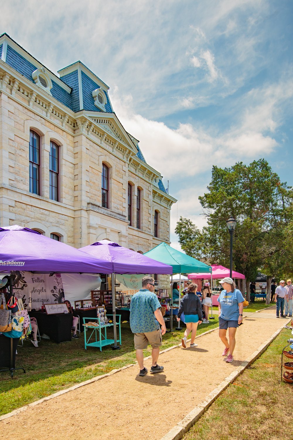 Market tents on the courthouse lawn in Blanco.