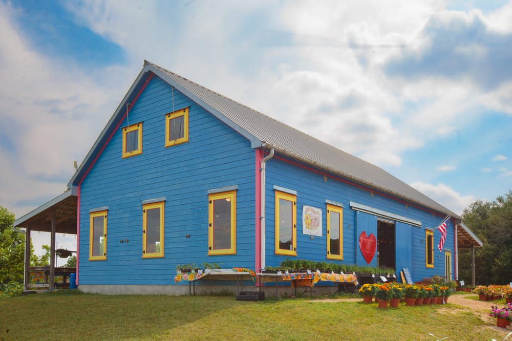Blue building houses Arnosky Family Farms.