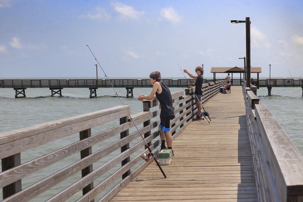 Anglers fish from the Fulton Fishing Pier