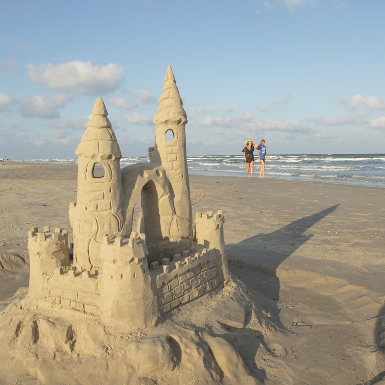 A large, multi-spired sandcastle