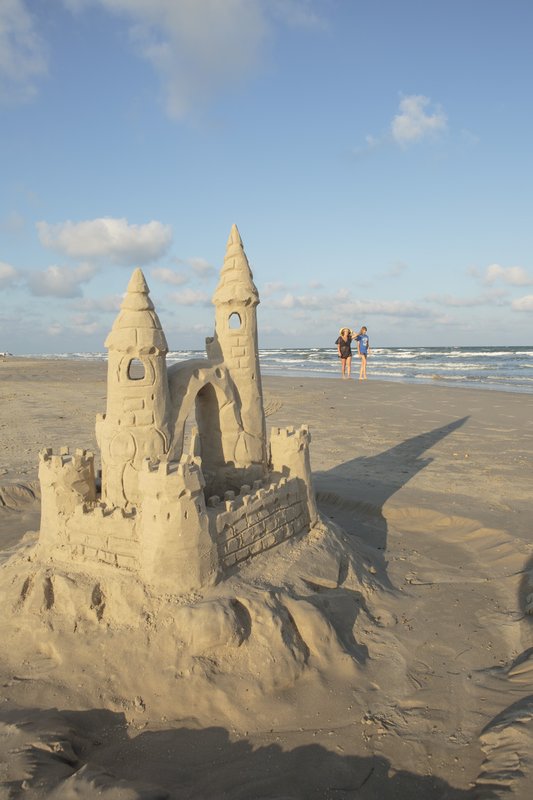 A large, multi-spired sandcastle