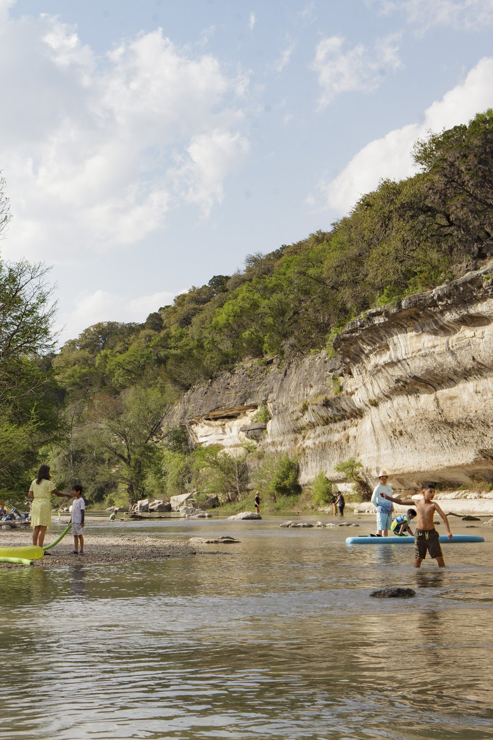 Swimmers, paddlers and anglers enjoy the cliff-lined waters of Guadalupe River State Park