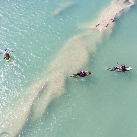 Ariel shot of three kayakers on the Devils River