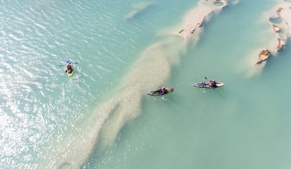 Ariel shot of three kayakers on the Devils River