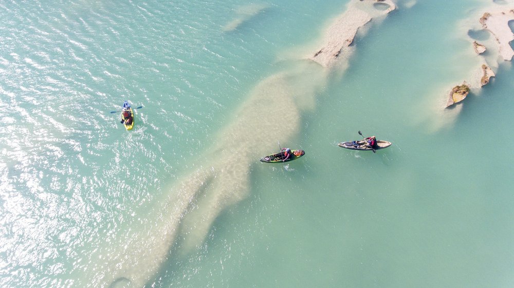 Ariel shot of three kayakers on the Devils River