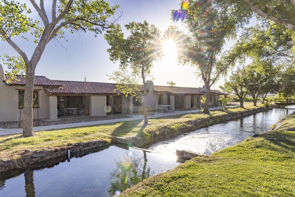 Cabins in Balmorhea State Park along the canals filled with spring water from the pool