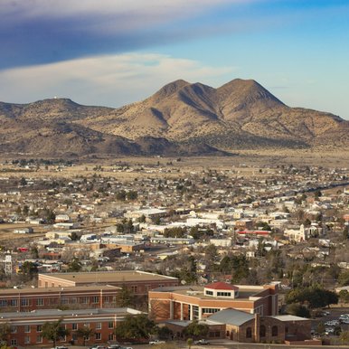 Overview of Alpine Texas showing Sol Ross University in foreground and mountains in background