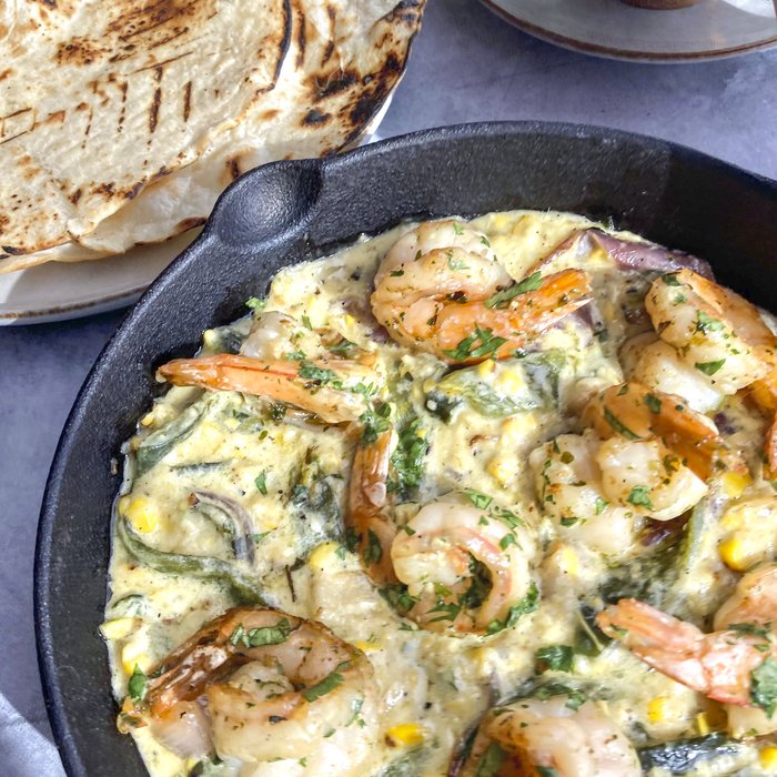 A picture of Rajas Poblanas Shrimp Tacos.