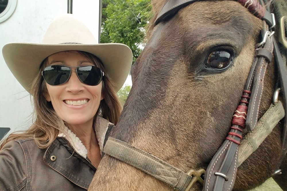 Author Shannon King poses with her horse at San Angelo state park
