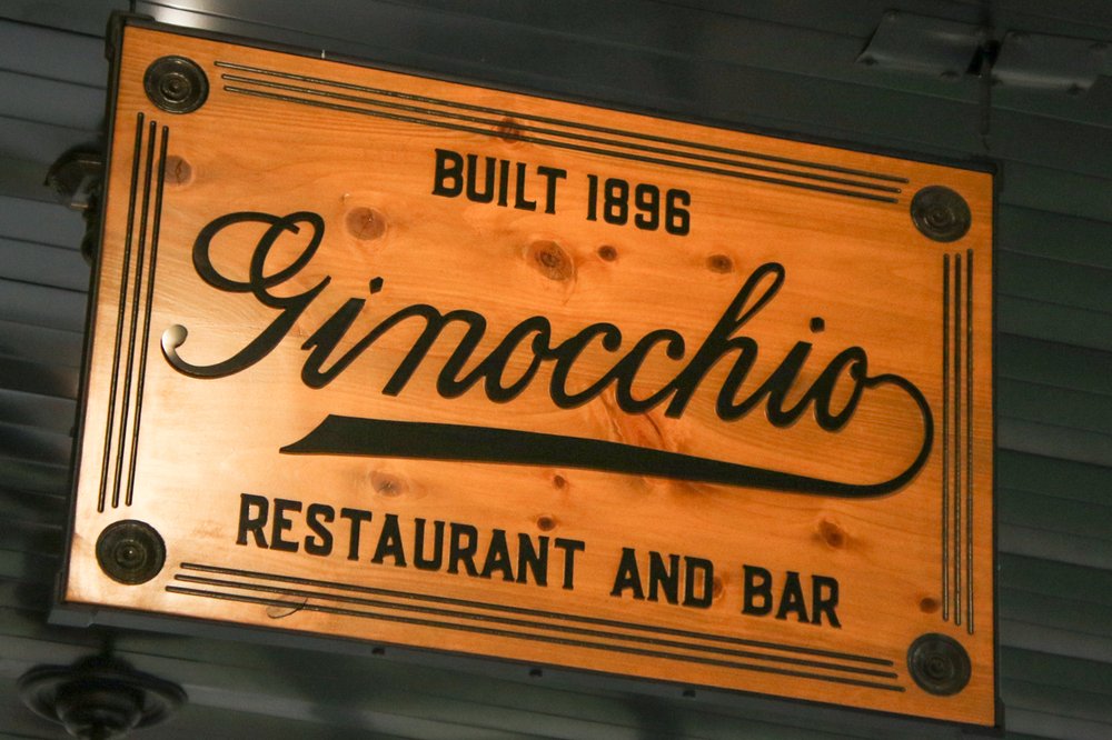Sign at the restored Ginocchio Hotel